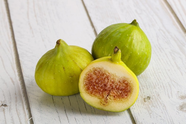 Ripe sweet juicy green fig fruit heap