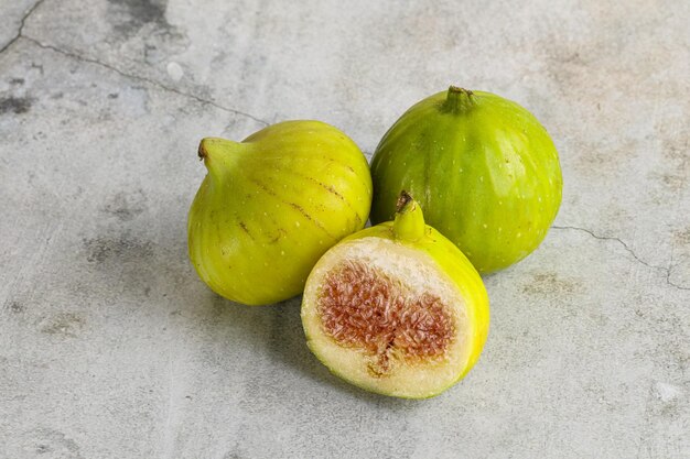 Ripe sweet juicy green fig heap