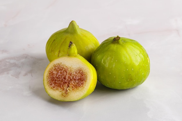 Ripe sweet juicy green fig heap