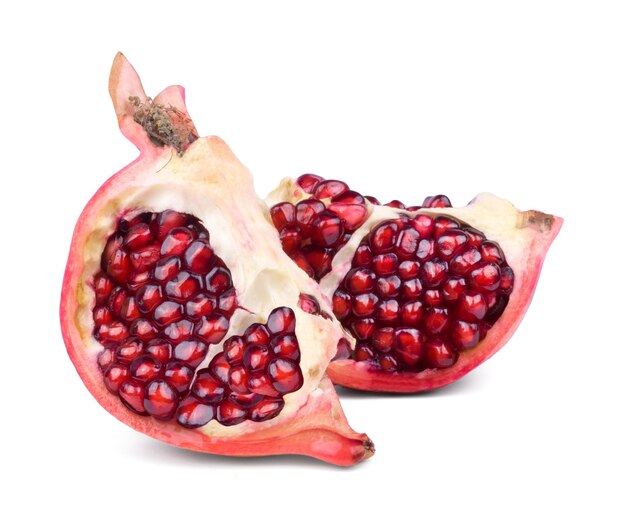 Ripe sweet pomegranate slices isolated