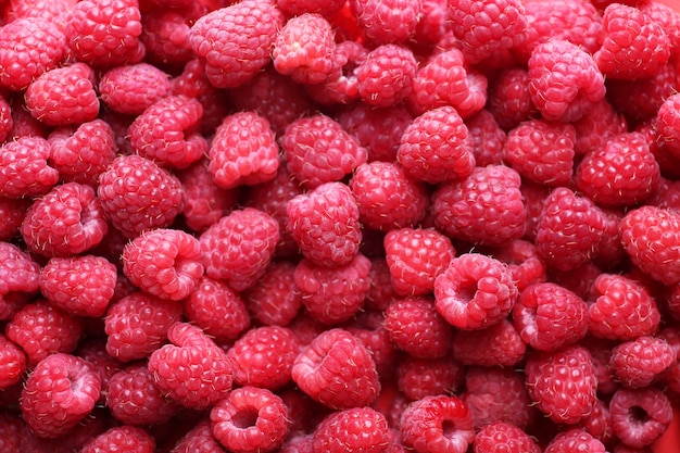 Ripe sweet raspberries close-up