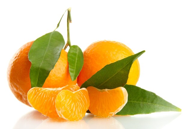 Ripe sweet tangerine with leaves, isolated on white