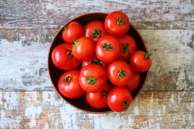 Ripe tomatoes in a bowl Harvest tomatoes