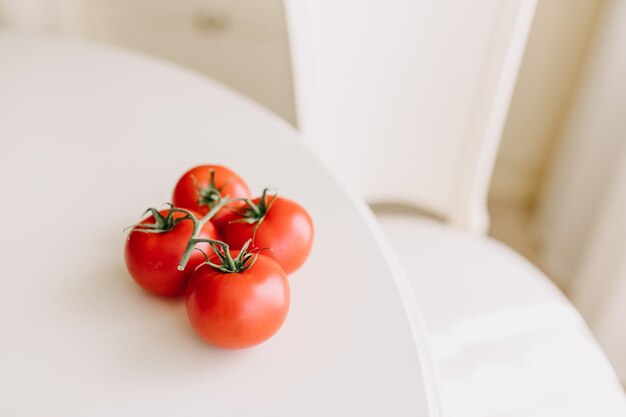 Ripe tomatoes on a plate.