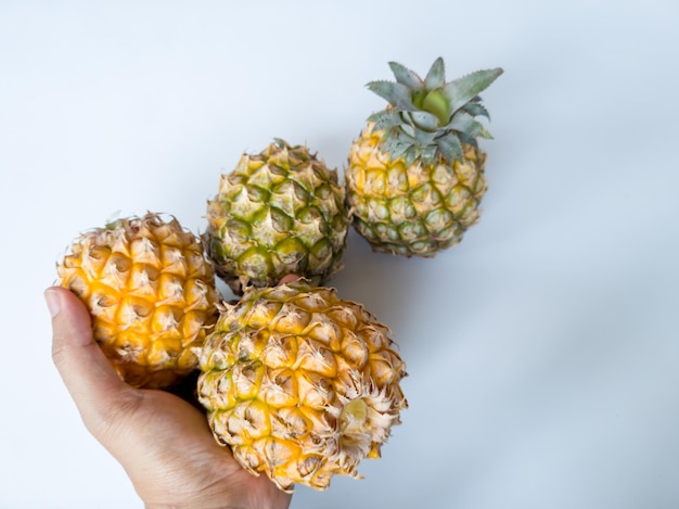 Ripe unpeeled pineapple contains many vitamins and minerals