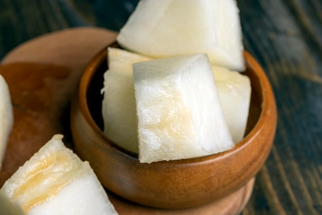 Ripe yellow melon cut into pieces and portions sweet large melon cut into cubes for eating natural dessert