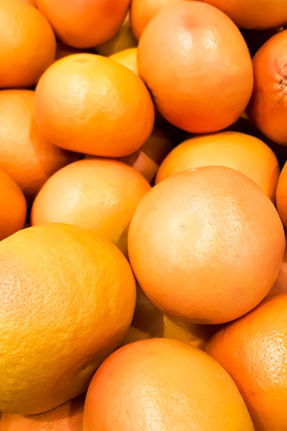 Ripe yellow tangerines at farmers market Organic eco food Selling fruit in supermarket