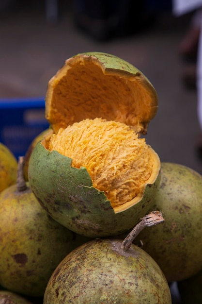 Ripe yellow wood apple for sale fruits market in Bangladesh Selective focus