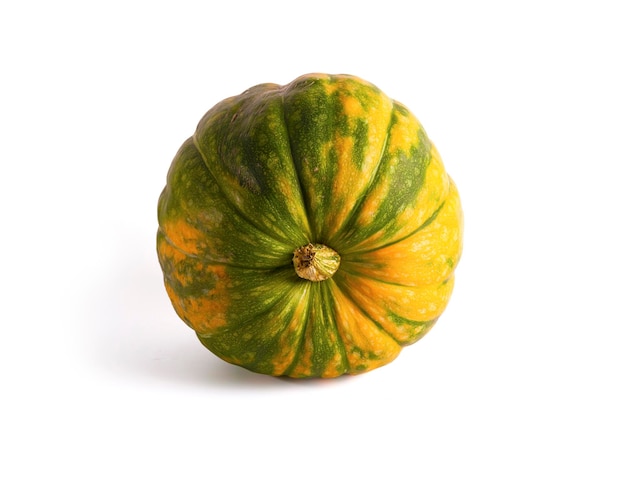 Ripe yellowgreen pumpkin on white background