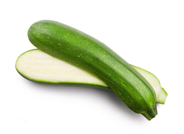 Ripe zucchini sliced in half isolated