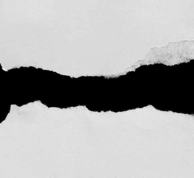 Ripped paper on black background