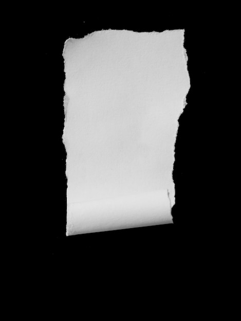 Ripped paper isolated on black background empty space for text