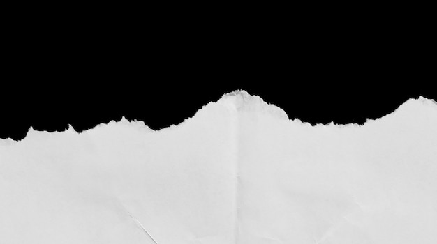 ripped paper isolated on black background with copy space for text