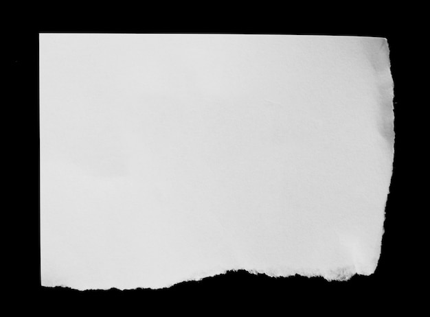 Ripped paper isolated on black background