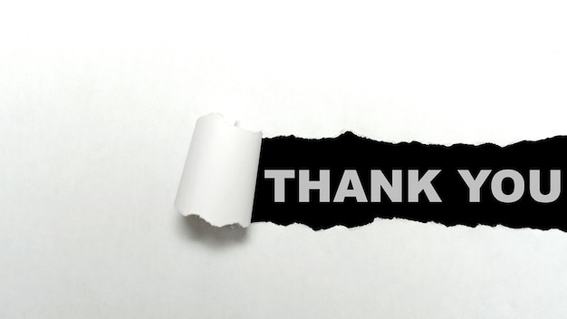 Ripped paper with Thank You text