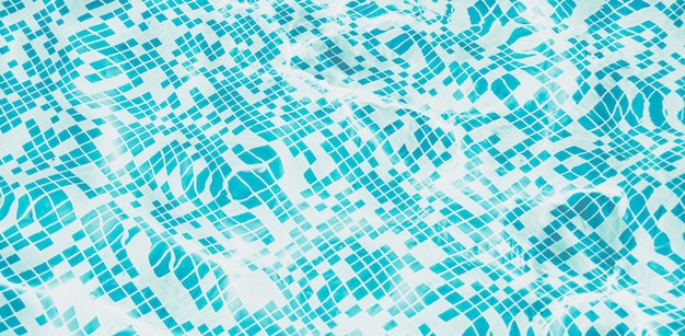 ripple water in swimming pool with sun reflection