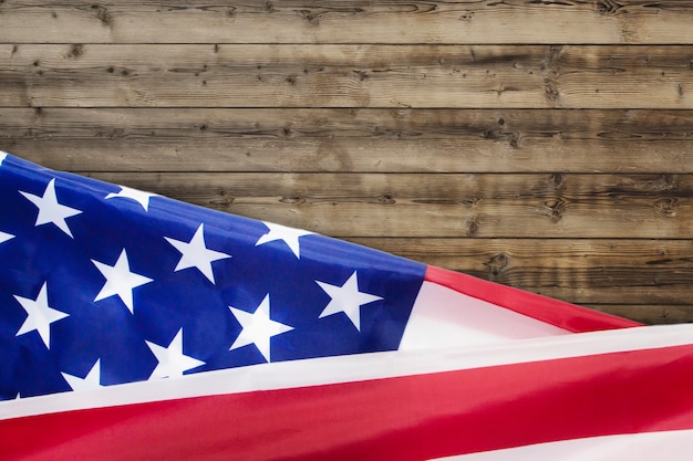 Rippled usa flag for fourth of july on wood