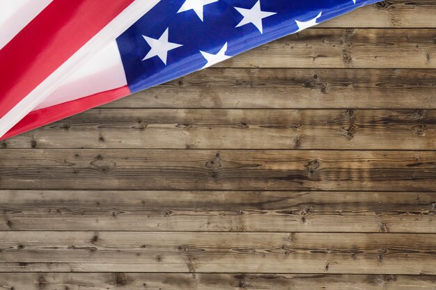 Rippled usa flag for fourth of july on wood