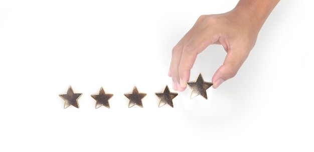 Фото Поднимитесь на пять звезд в человеческой руке, улучшите концепцию классификации оценки рейтинга