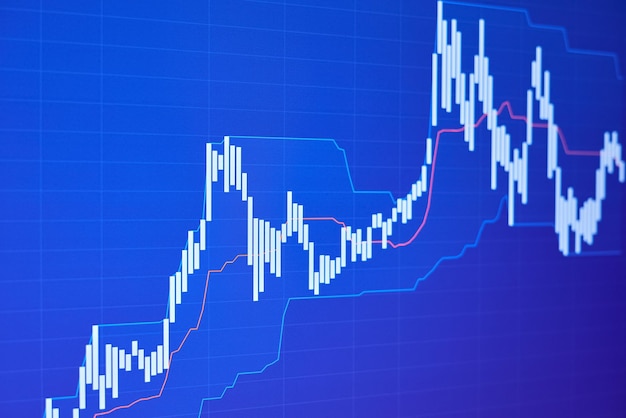 Rising stock market chart on blue background