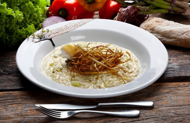 Risotto, italian food, with brie cheese