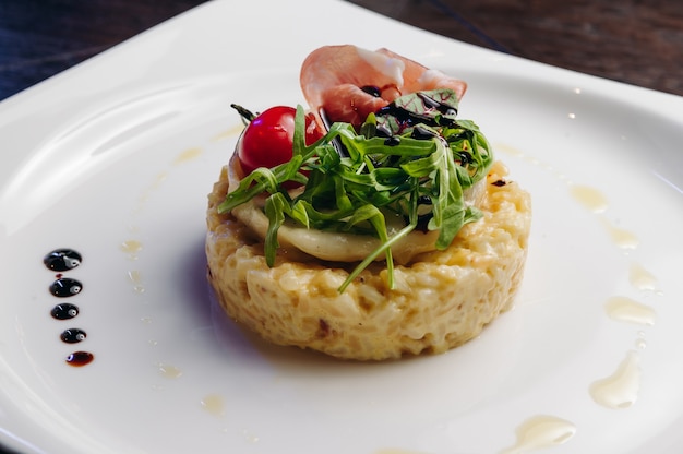 Risotto met Parmaham Rucola en camembert Kaas