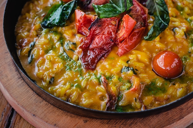 Risotto with dried tomatoes and basil.