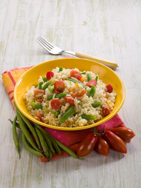 Risotto with green beans and tomatoes