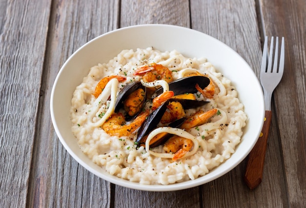 Risotto with mussels shrimps and squid Italian cuisine Seafood