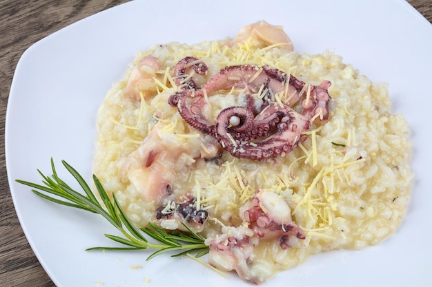 Foto risotto con polpo