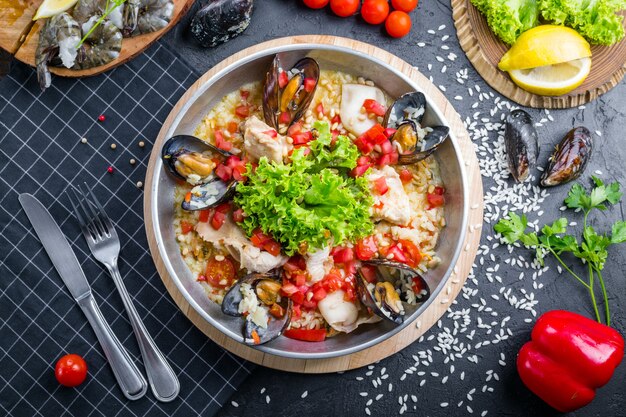 Risotto with seafood. Rice with mussels and shrimps.