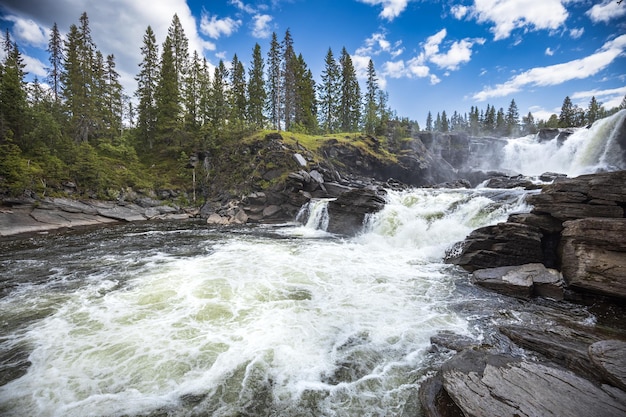 Photo ristafallet waterfall in the western part of jamtland is listed as one of the most beautiful waterfalls in sweden