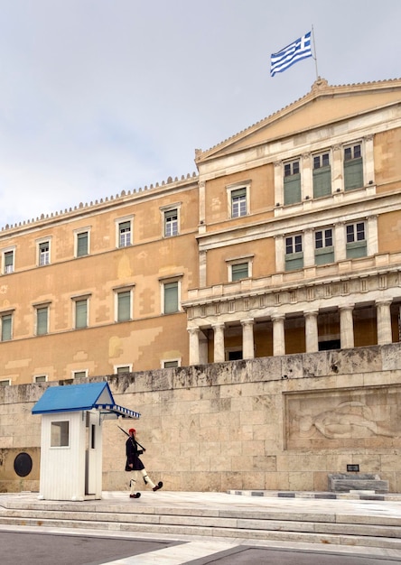 Ritual of the changing of the guard of the greek guards evzones\
greek parliament in athens greece