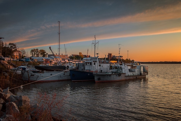 River boats in the parking lot in the evening Front view