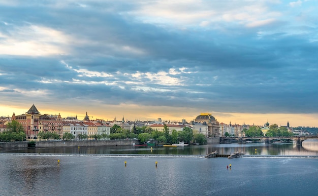river by cityscape against sky