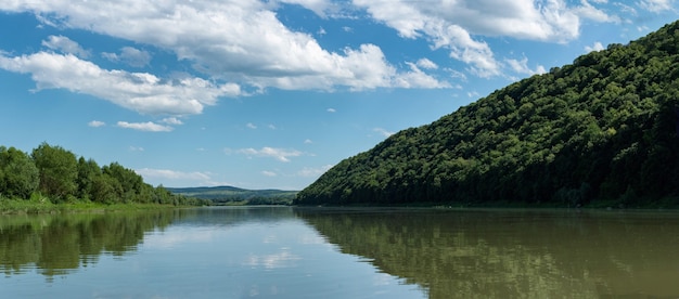 River canyon with green hills