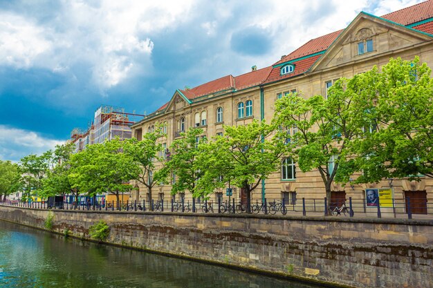 A river channel in a European city. Great sunny day for walking