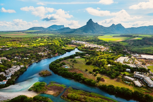 A river flowing into the ocean on the tropical island of Mauritius