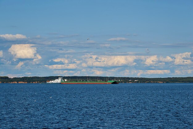 River landscape with a floating barge