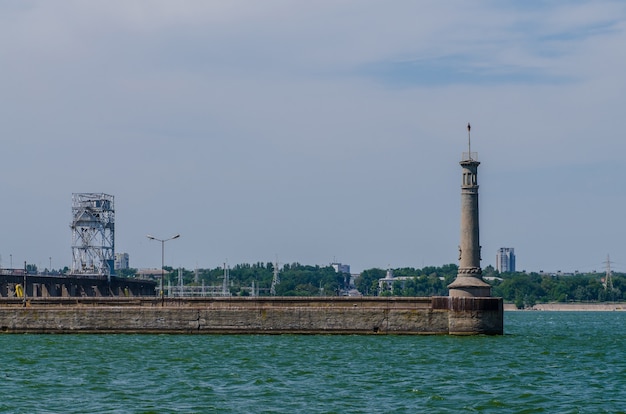 River lighthouse on the gateway through the cascade of hydroelectric power