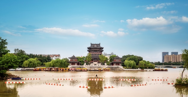 The river and the old buildings under the blue sky 