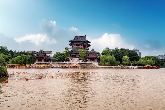 The river and the old buildings under the blue sky 