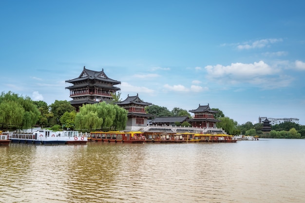 The river and the old buildings under the blue sky 