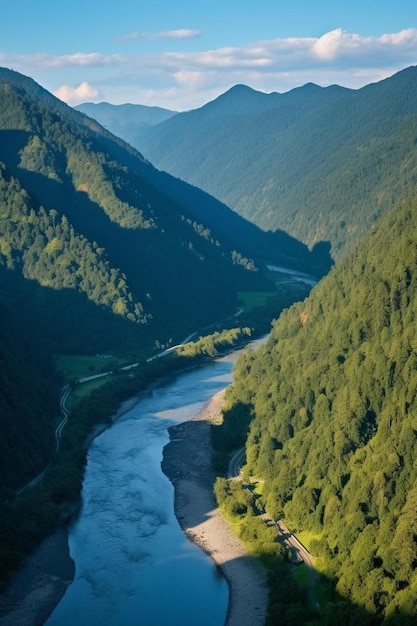 a river runs through a valley with a mountain in the background