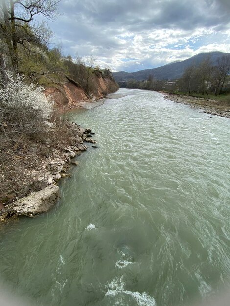 A river with a mountain in the background