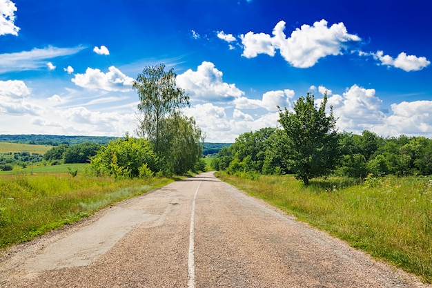 Road against the blue sky. Beautiful landscape.