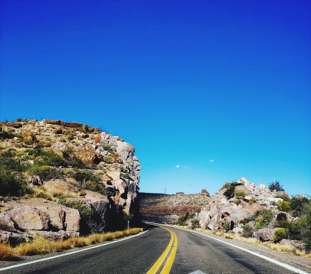 Road against blue sky