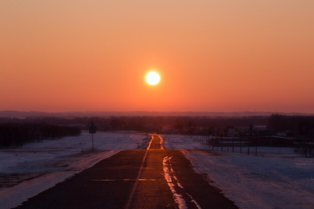 Road against sky during sunset