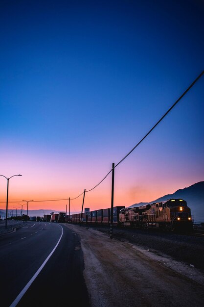 Road against sky at sunset