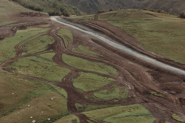 Road in the Caucasus Mountains in foggy day